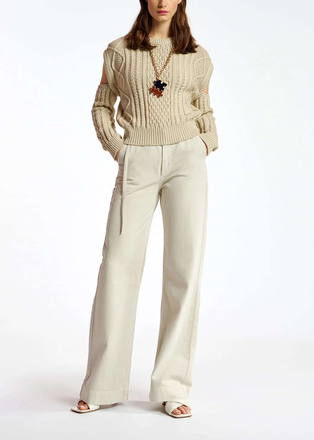 Ecru cable-knitted sweater with detachable sleeves