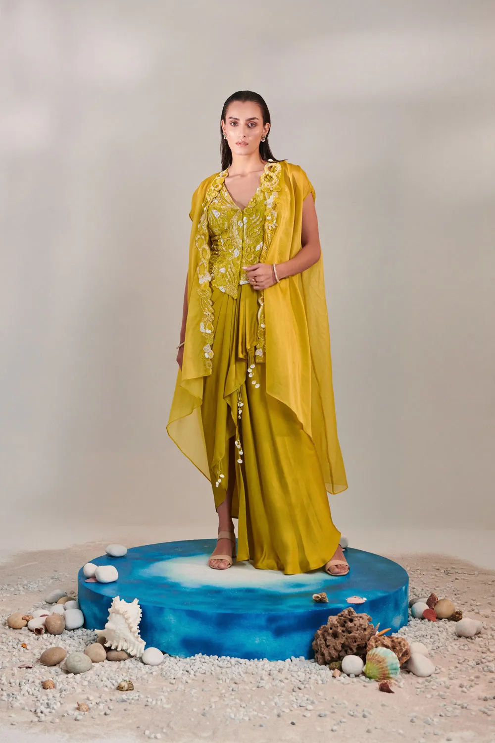 Satin Organza Cape And Fitted Sleeveless Jacket And Drape Skirt Set; Hand Embroidered In Lime Yellow Shade.